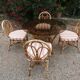 dining table and chairs made of curved bamboo and rattan with smoked glass from the 1970s