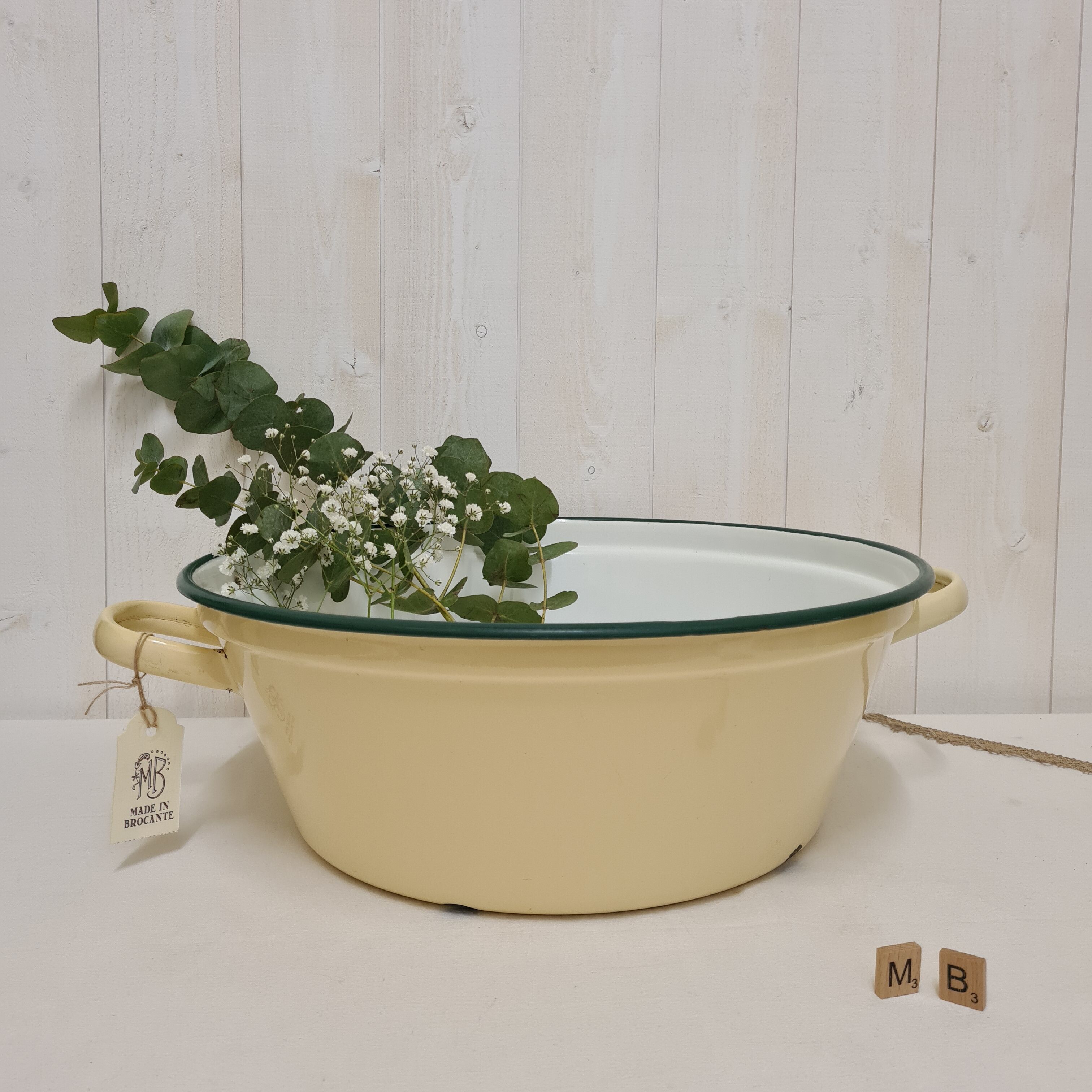 Yellow enamelled sheet metal basin
