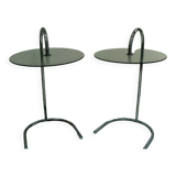 Two glass and metal bedside tables