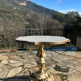 Carved and lacquered wooden side table.