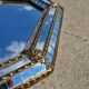 Octagonal Hollywood Regency Mirror with Floral Brass Accents, 1970s