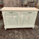 Carved flowered sideboard