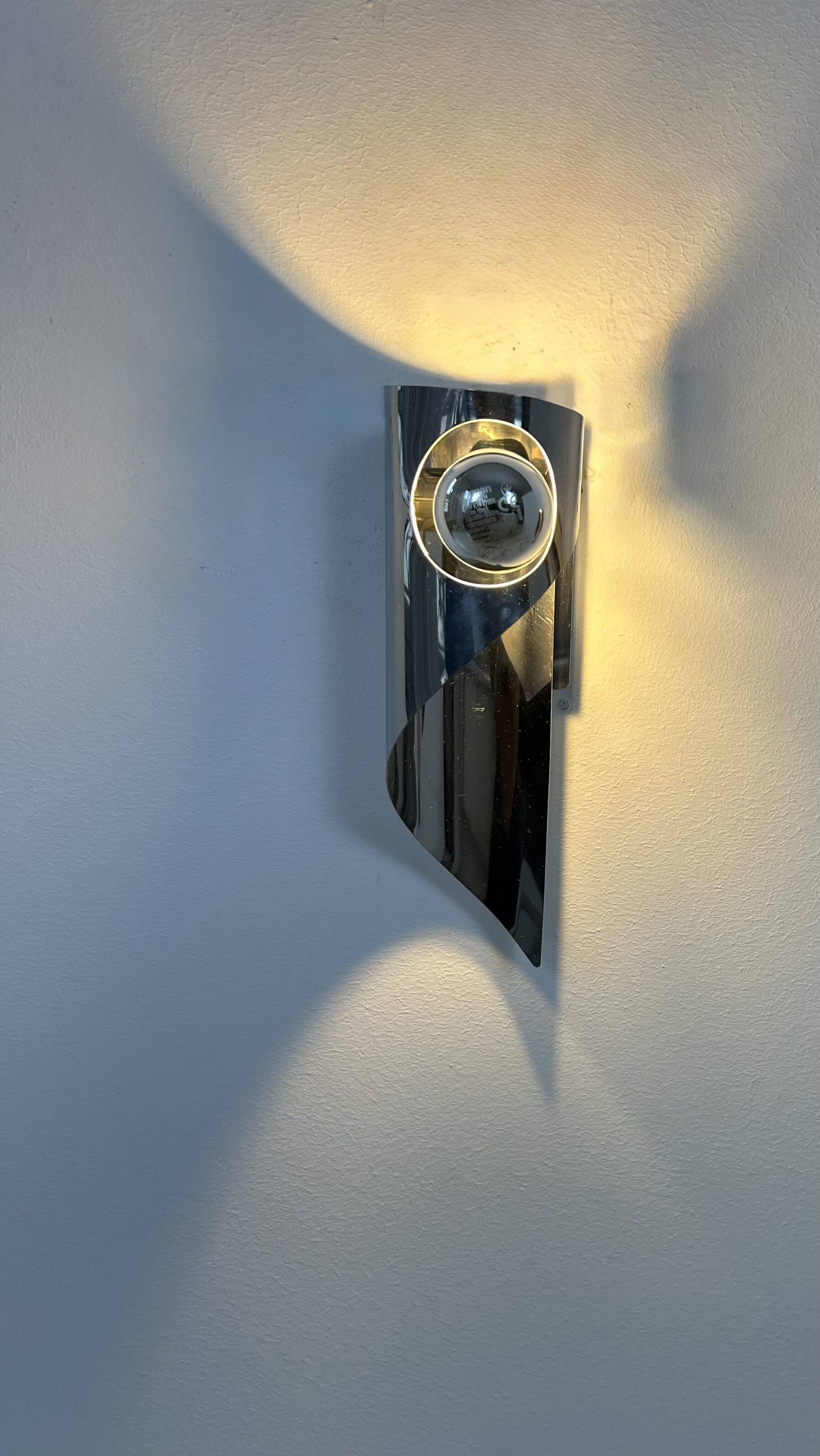 Pair of vintage wall lights, chrome metal, France, 1970.