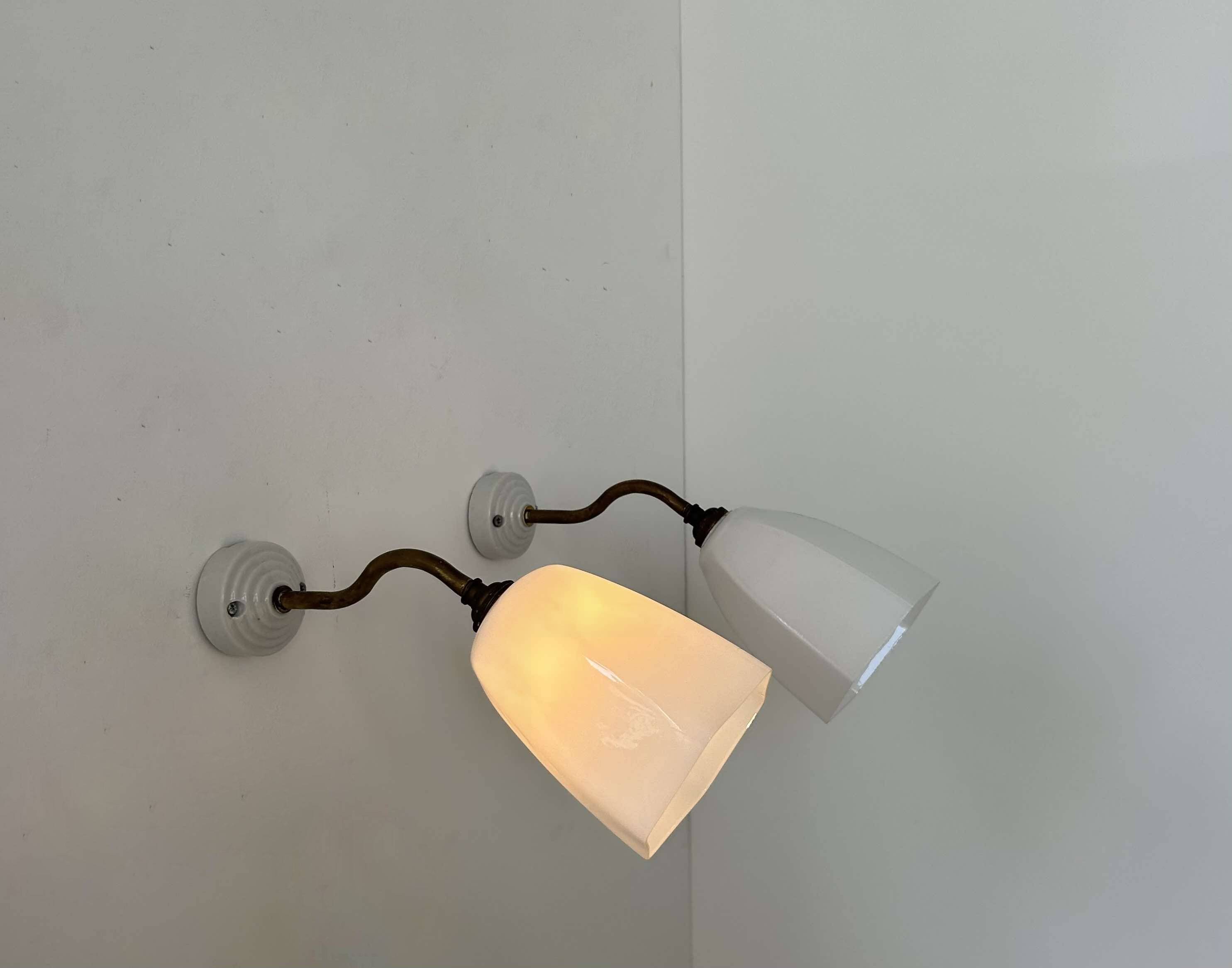 Pair of brass and opaline wall lights, France 1930