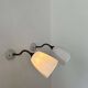 Pair of brass and opaline wall lights, France 1930