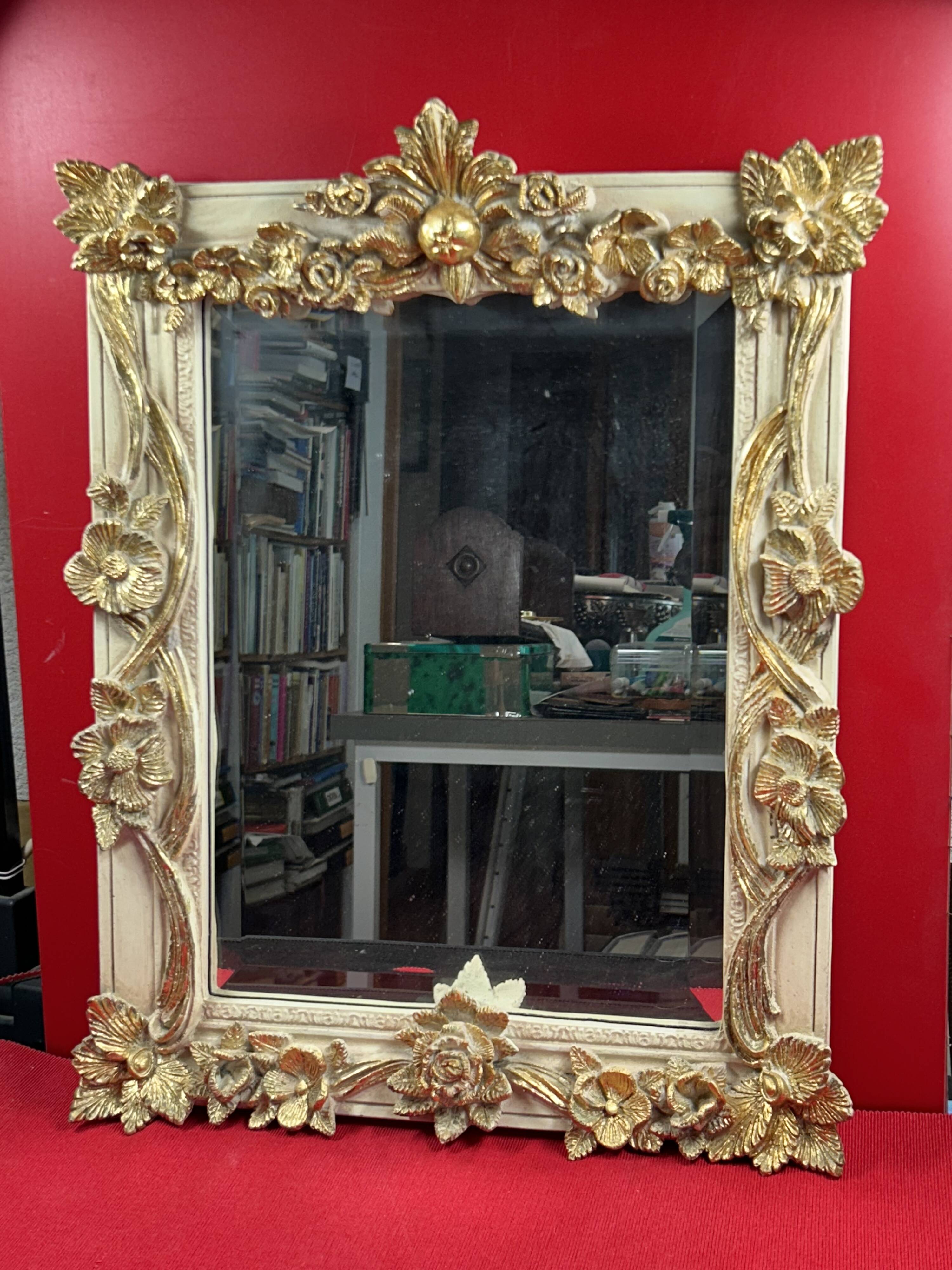 19th century style beveled mirror with garlands of flowers and leaves