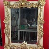 19th century style beveled mirror with garlands of flowers and leaves