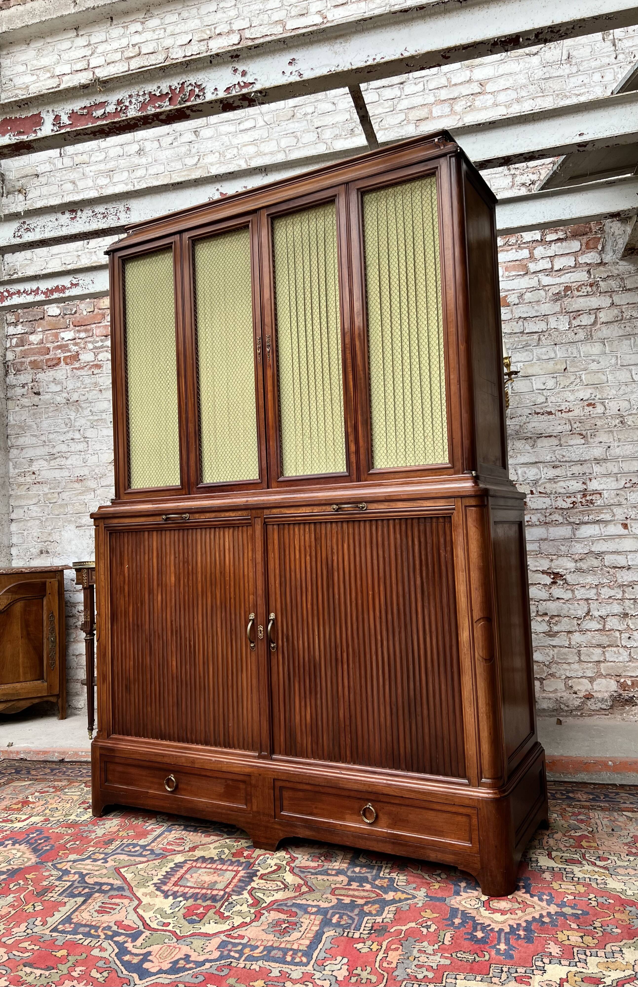 Large mahogany library in Louis XVI style stamped from the Bettenfeld House in Paris.