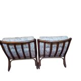 Pair of vintage rattan armchairs  
1960s–1970s