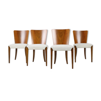 Ensemble de quatre chaises à manger restaurées modèle H-214 conçu par Jindřich Halabala, années 1950.