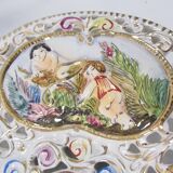 Capedimonté openwork plate, 4 seasons putto