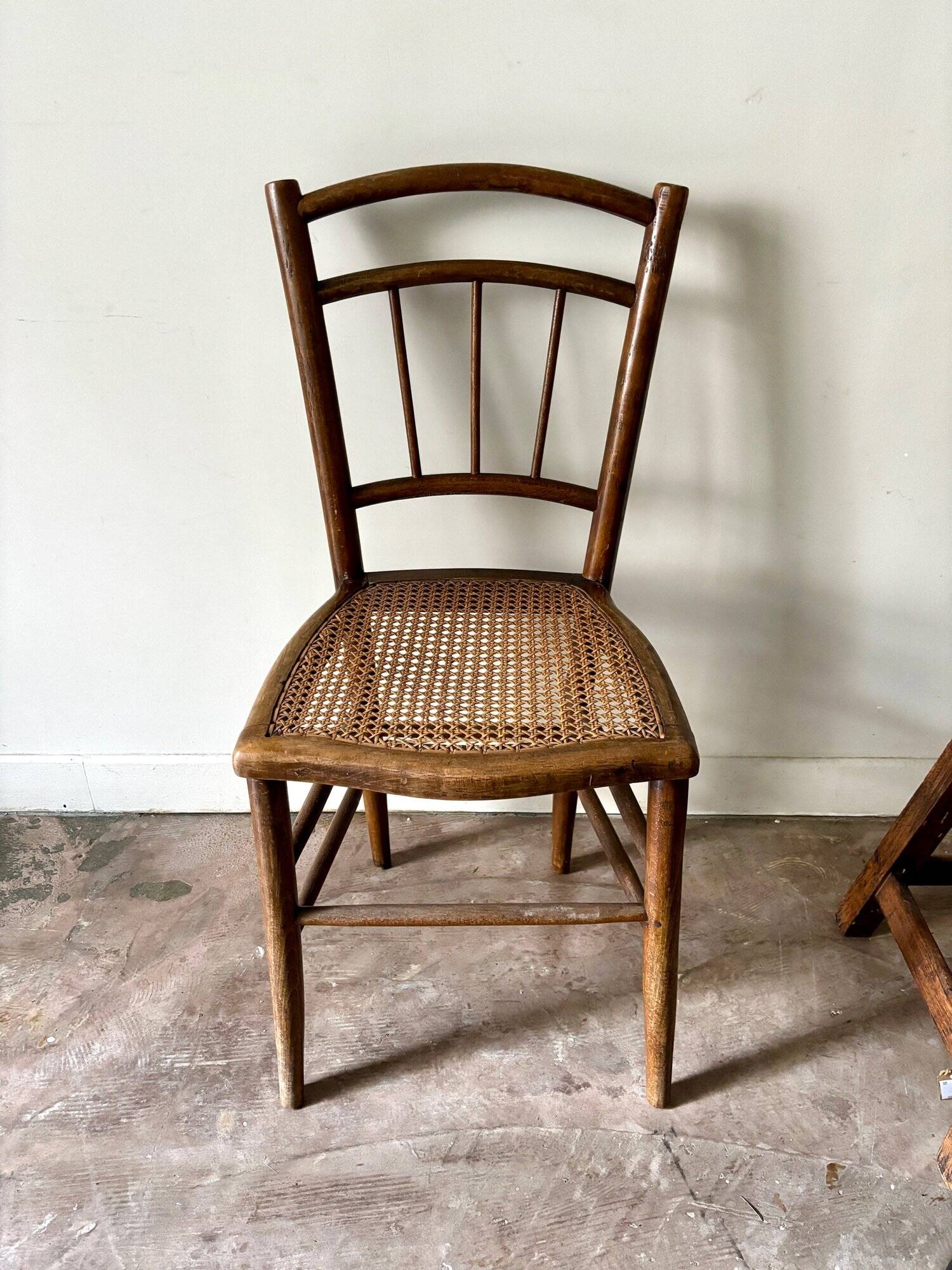 Wooden and cane bistro chair