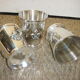 3 silver cups, lily flower