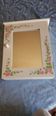 White mirrored toilet cabinet with floral pattern