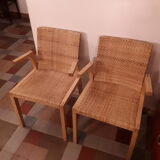 Two vintage braided straw armchairs