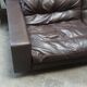 Four-seater sofa in dark brown leather from Steiner by designer Pascal Daveluy, model