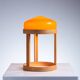 Bent oak wood table lamp with orange glass shade