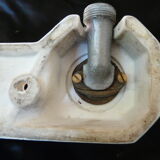 Old ceramic bathroom shelf with 2 chrome bronze faucets
