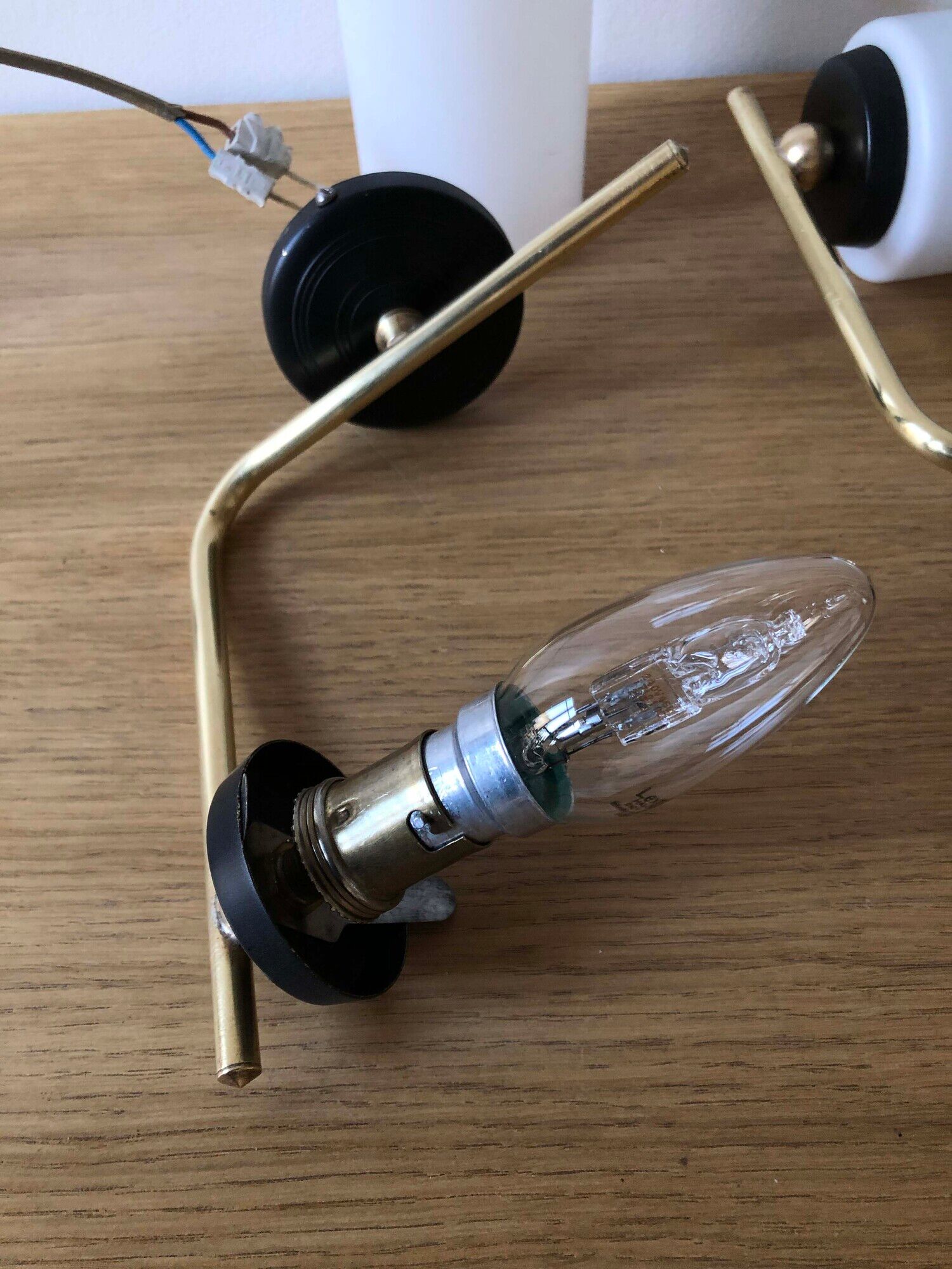 Pair of brass tube wall light and 1960s opalin glass