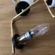 Pair of brass tube wall light and 1960s opalin glass