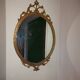 Baroque mirror in gilded brass, C.G.R