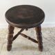Tabouret en bois tourné tripode vintage