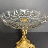 Antique crystal bowl on a bronze stand.