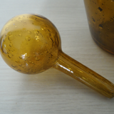 Bulgy blown and bubble glass carafe amber