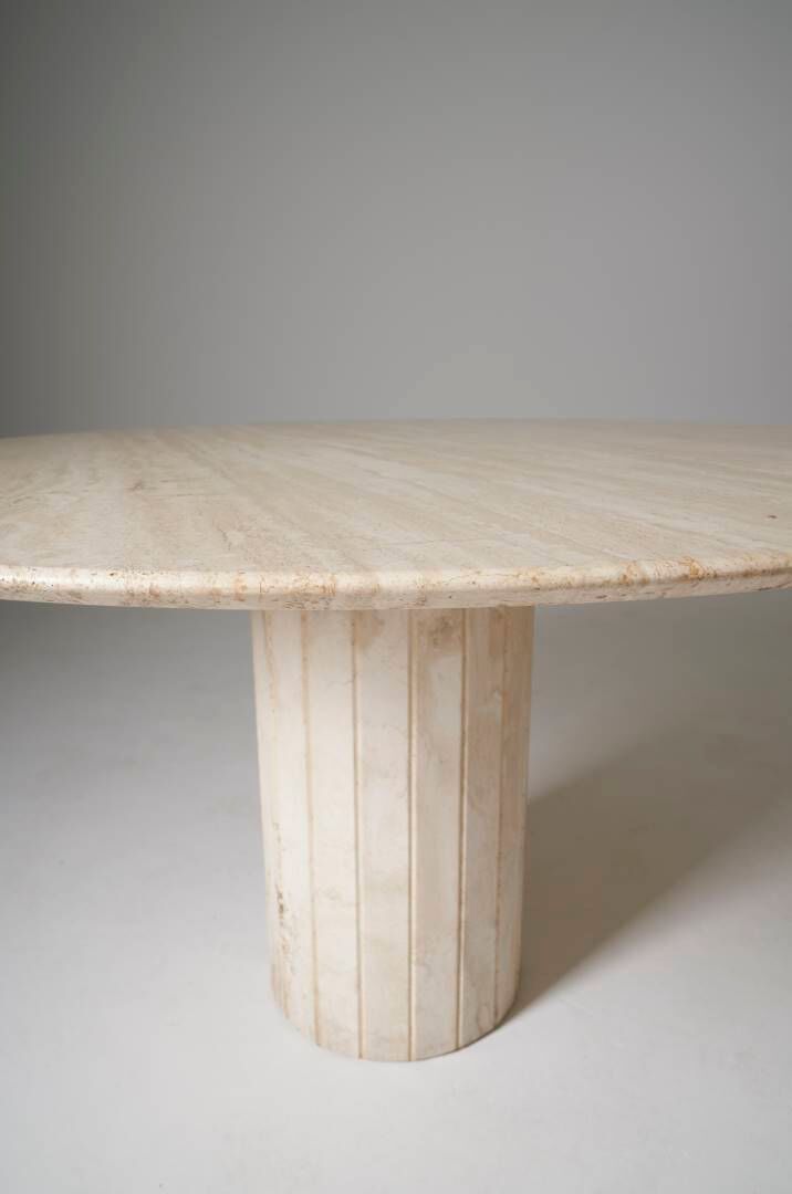 Round travertine dining table