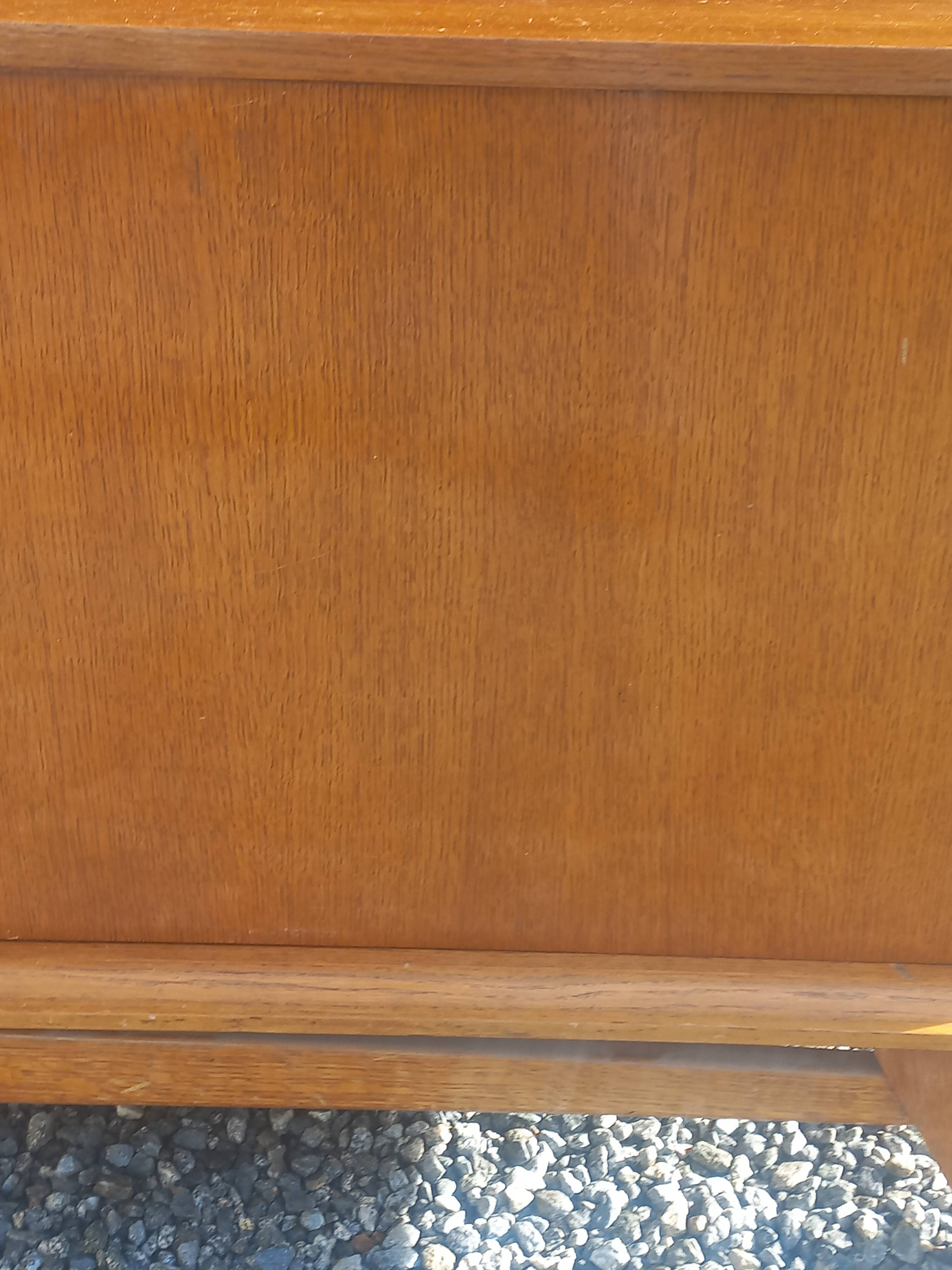 Vintage oak sideboard with splayed legs from the 1950s.