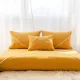 Set of yellow Moroccan floor sofa covers.