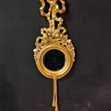 Pair of round Louis XVI style giltwood mirrors
