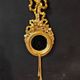 Paire de miroirs ronds en bois doré de style Louis XVI
