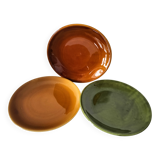 Set of green and amber enamelled plates