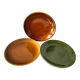 Set of green and amber enamelled plates