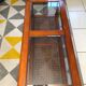 Table basse en merisier plateau verre cannage