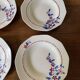Saint Amand hollow plates decorated with red and blue flowers