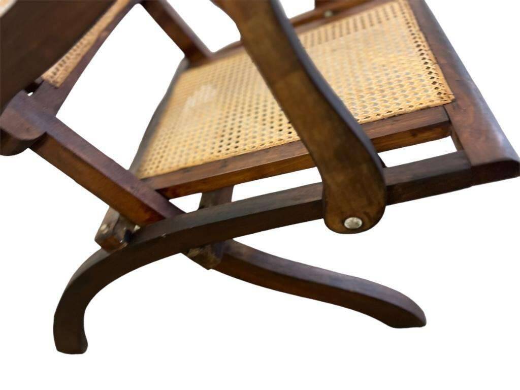 Antique folding chair with weaved seat/back