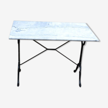 Vintage bistro-style table in light marble