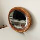 Antique oval mirror with beveled glass in wood and stucco, 19th century