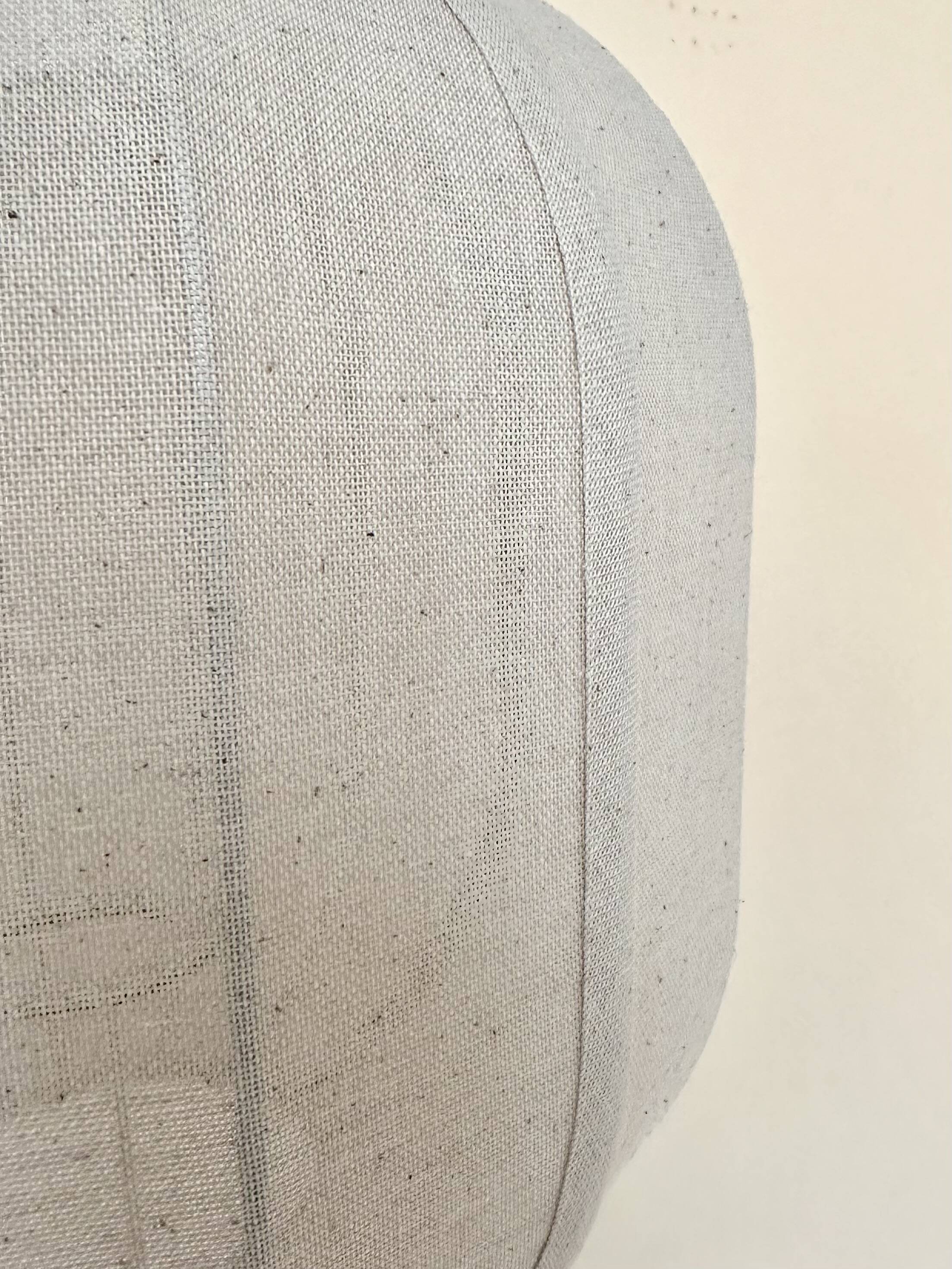 Travertine lamp with round linen shade