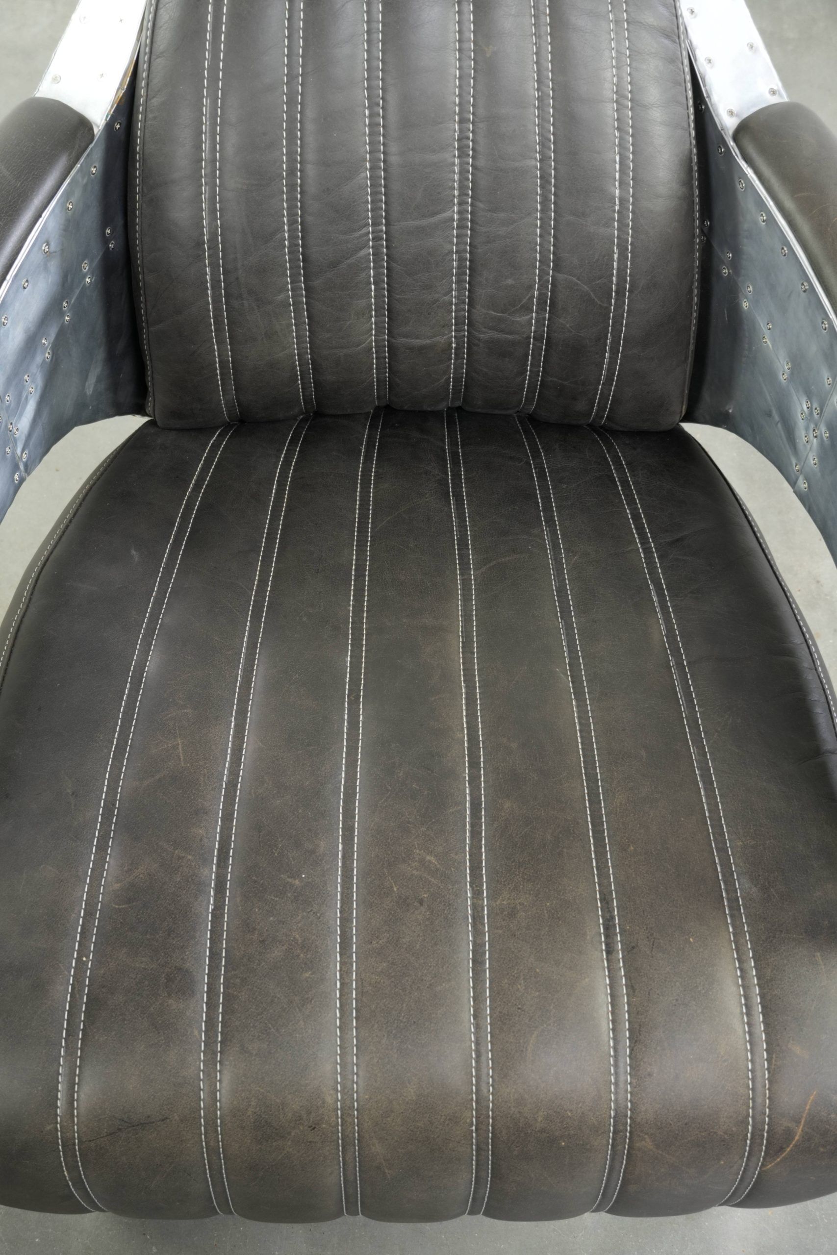 Comfortable cow leather aviator design armchair finished with aluminium