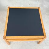 Baumann coffee table with black medium-density top