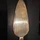 Golden metal cheese cutlery imitating bamboo