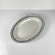 Large oval dish "Rachel" Moulins des loups & Hamage, iron earth, 20th century