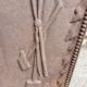 19th century cast iron fireback: bishop blessing the blacksmith's tools