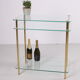 Hollywood Regency side table with gold-colored legs