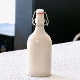 Bouteille à bière ancienne en grès émaillé signée MKM