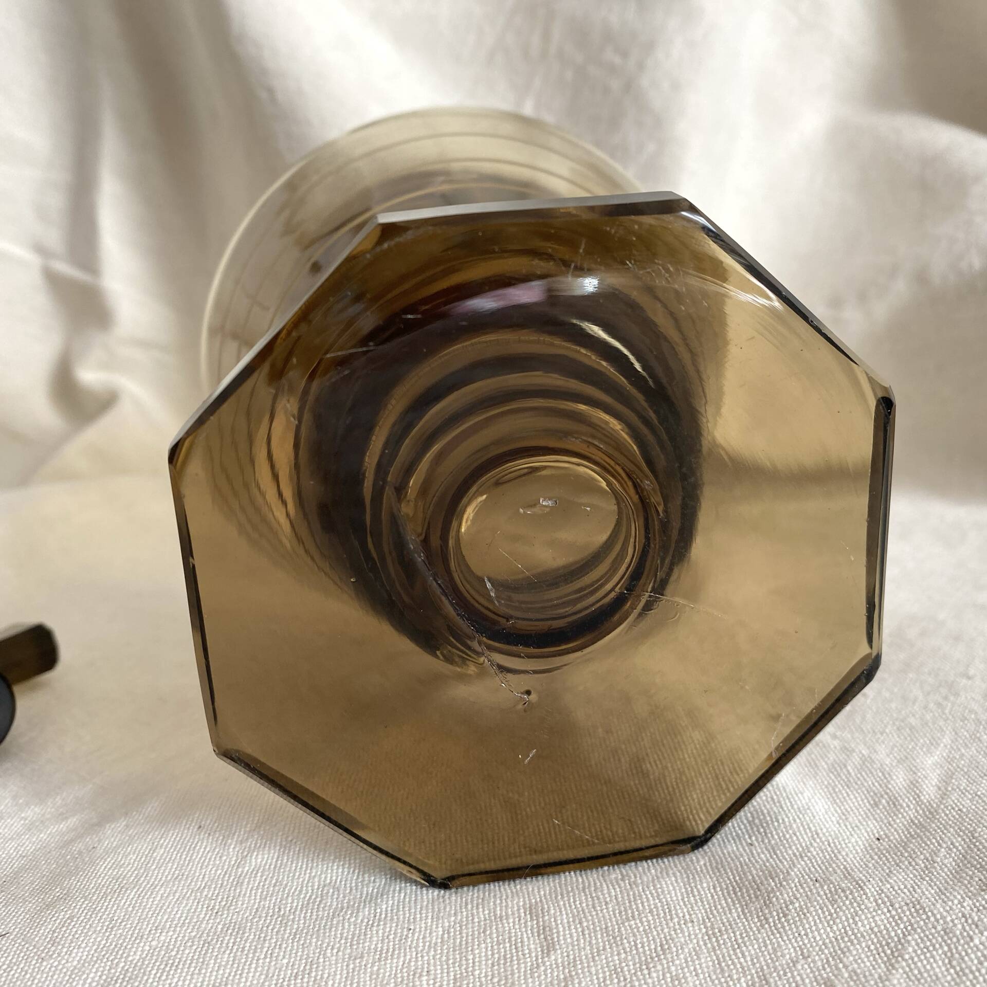 Art Deco smoked glass carafe with fan-shaped stopper.