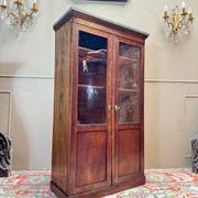 Bibliothèque vitrine formant cartonnier en acajou d’époque restauratio